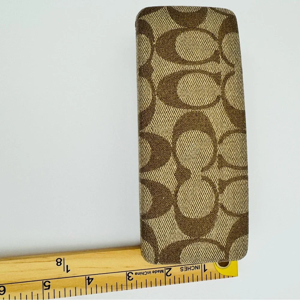 Coach signature khaki and brown coated canvas hard shell sunglasses case.